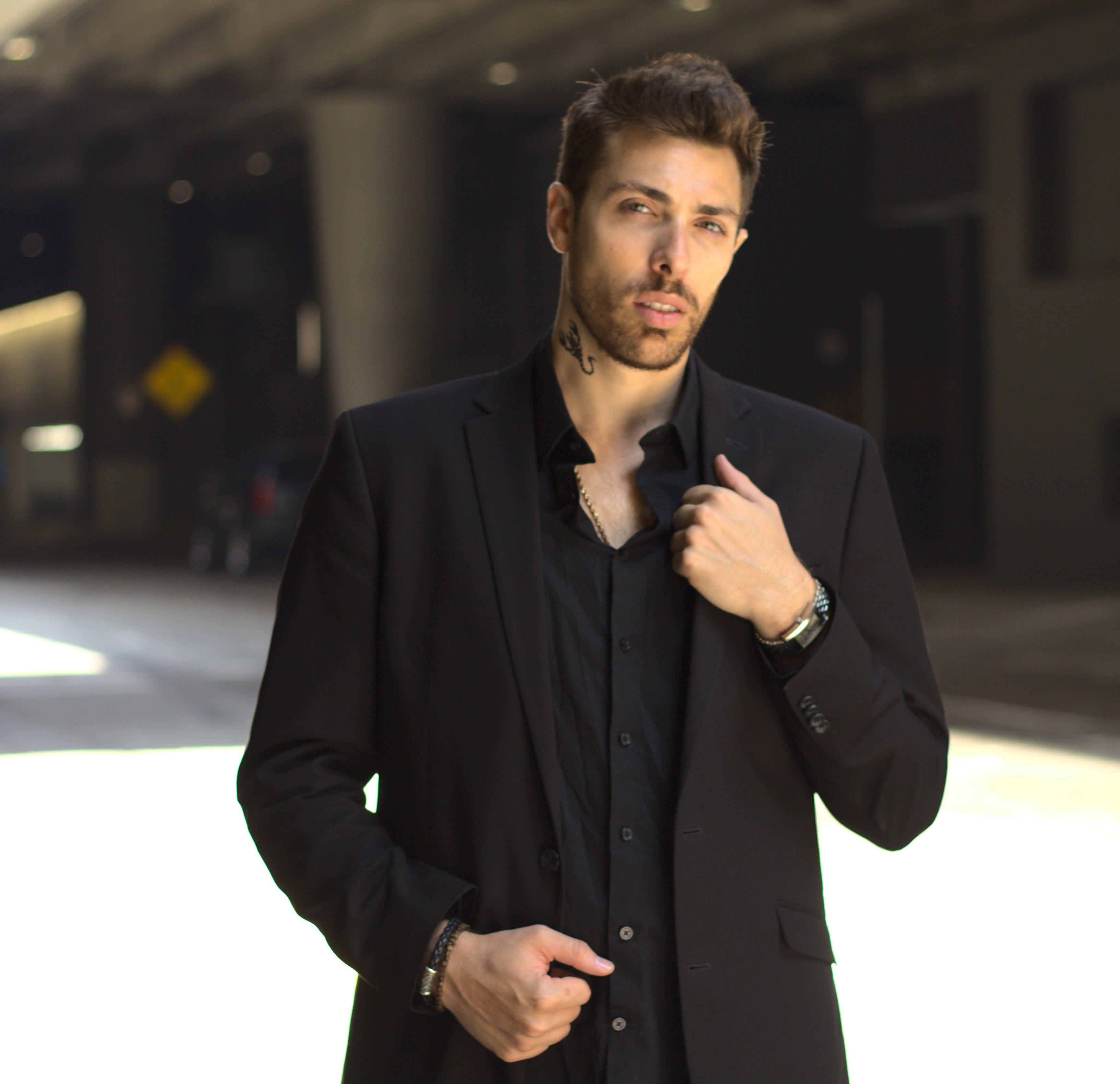 Alex Veach (Alexander Veach) DTLA editorial, all-black look in concrete underpass.