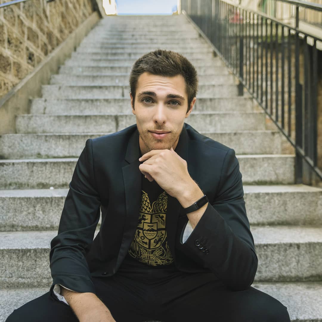Alex Veach (Alexander Veach) travel portrait on Italian stone steps, blazer.