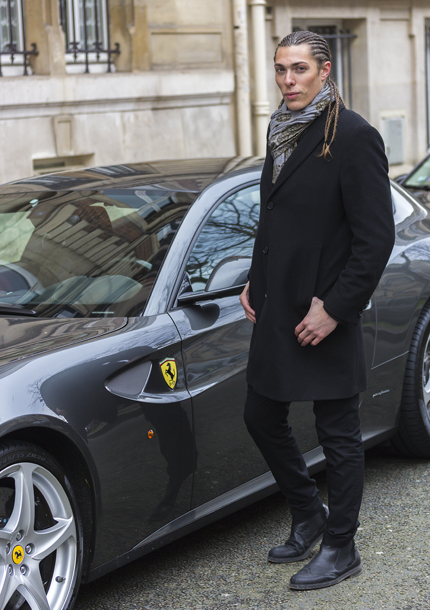 Alex Veach (Alexander Veach) Paris editorial in wool overcoat beside a black Ferrari.